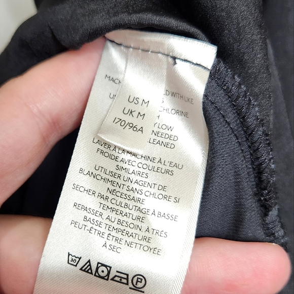 Free People Black Bea Tassel Sleeveless Romper Shiny Sz Medium Open Back - Picture 8 of 9